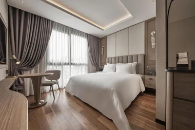 Camera Deluxe King — La Siesta Premium Saigon