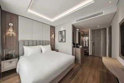 Camera comunicante Deluxe per 4 persone — La Siesta Premium Saigon